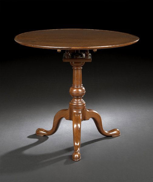 American Pennsylvania Mahogany Tilt-Top Tea Table: American Pennsylvania Mahogany Tilt-Top Tea Table, 18th century, the circular dished top on a bird's-eye support, joined to a columnar tripodal base with pad feet, h. 29", dia. 32".