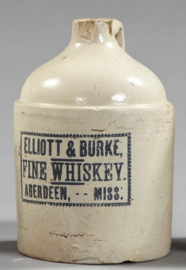 One-Gallon Stoneware Whiskey Jug,: One-Gallon Stoneware Whiskey Jug, fourth quarter 19th century, by Elliott and Burke, Aberdeen, Mississippi, the facade with the Elliott and Burke mark in charcoal gray, h. 11", dia. 7-3/8".