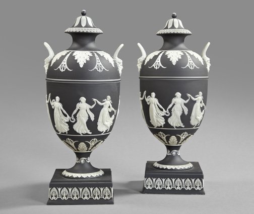Pair of Wedgwood Garniture Vases: Fine, Large and Rare Pair of Wedgwood Garniture Vases, third quarter 19th century, the black and white jasper vases of covered, two-handled and footed form in "Dancing Hours" decor, the bases with the