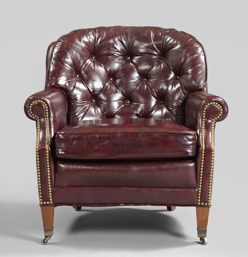 Edwardian-Style Mahogany Club Chair: Edwardian-Style Leather-Upholstered and Mahogany Club Chair, the padded, domed and tufted back joined by outscrolled arms to the cushioned seat, raised on tapering square legs ending in brass caps, h.