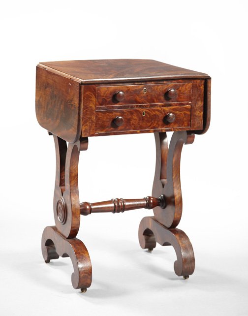 American Late Classical Mahogany Work Table,: American Late Classical Mahogany Work Table, second quarter 19th century, the top with a pair of drop leaves flanking a pair of drawers, raised on a lyre-form trestle base with turned stretcher and sc