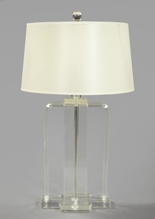 Lucite Double-Arched Straight-Sided Table Lamp: Elegant Lucite Double-Arched Straight-Sided Table Lamp, on a cruciform base in the Post-Modern style, fitted with a bone-white faux-vellum shade of drum form, h. 27-3/4", w. 10", d. 6".