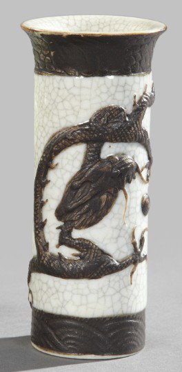 Kuang Hsu Porcelain Rouleau Vase: Kuang Hsu White Crackle and Parcel-Bronzed Porcelain Rouleau Vase, fourth quarter 19th century, of small size in "Celestial Dragon and Pearl" decor, the base with a calligraphic colophon in brown over