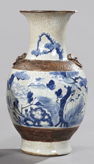 Kuang Hsu Porcelain Vase: Kuang Hsu Blue and White Crackle-Glazed Porcelain Vase, fourth quarter 19th century, of two-handled form with bronzed detailing, the facade decorated with a pair of songbirds, oriental rocks, peonies 