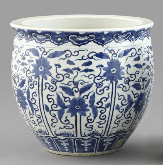 Kuang Hsu Blue and White Porcelain Jardiniere: Kuang Hsu Blue and White Porcelain Jardiniere, fourth quarter 19th century, in floral decor, signed on the base in underglaze blue calligraphy, h. 9", dia. 10".