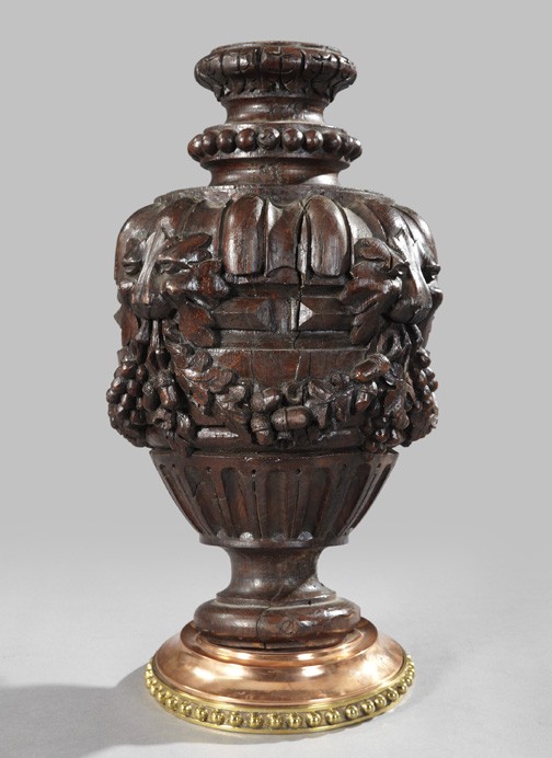 Attractive Edwardian Carved Oak Garniture Vase: Attractive Edwardian Carved Oak Garniture Vase, first quarter 20th century, of large size in the style of Robert Adam (English, 1728-1792), the vase carved with leonine masks joined by "Vintage" garla