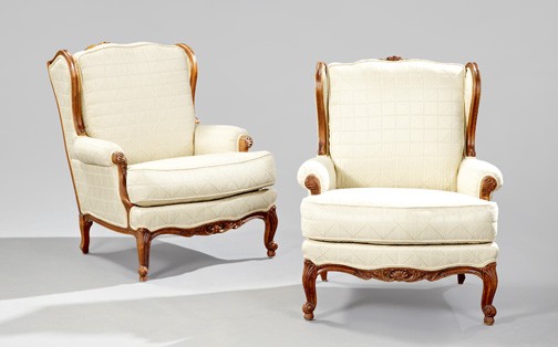 Louis XV-Style Carved Fruitwood Bergeres: Handsome Pair of Louis XV-Style Carved Fruitwood Bergeres, each with a shaped and cushioned back joined by shaped sides and outscrolled arms to the cushioned seat, raised on cabriole legs ending in sc