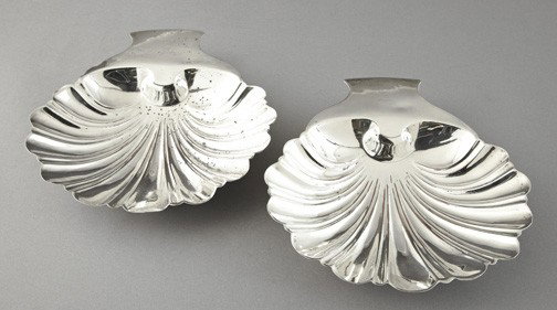 Electroplate Plate Serving Bowls: Stylish Pair of Electroplate Serving Bowls, second quarter 20th century, of footed shell form, each with an engraved armorial, the feet modeled as seashells, h. 1-3/4", w. 9-1/4", d. 14-1/4".