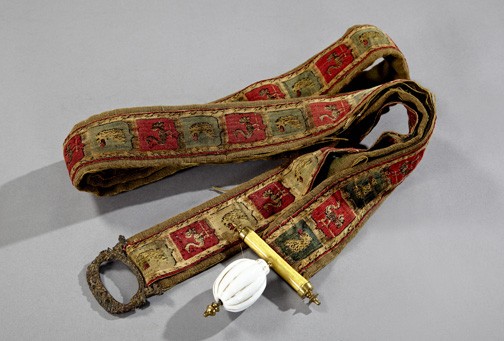 Continental Petit-Point Armorial Bell Pull,: Continental Petit-Point Armorial Bell Pull, third quarter 19th century, the face mounted with a broad printed velvet ribbon featuring armorial crests of alternating leopard heads and ostriches, headed