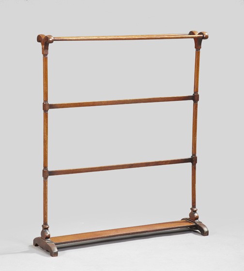 Continental Mahogany Towel Rack,: Continental Mahogany Towel Rack, late 19th century, the turned posts at each end joining the cross bars and ending in a trestle-form base, h. 43-1/4", w. 35-3/4", d. 6-1/2".