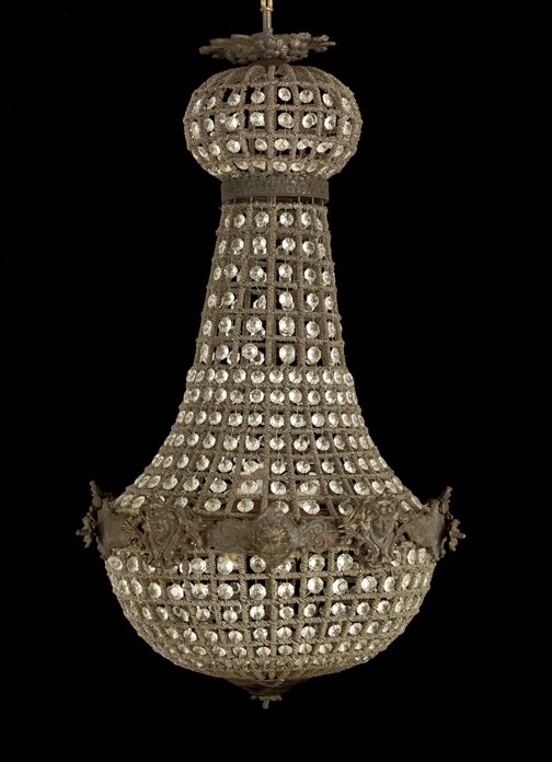 French Brass and Cut Glass Chandelier: French Bronze-Patinated Brass and Cut Glass Chandelier, first quarter 20th century, of stylized bell form in the Louis XVI taste, the entire frame wrapped in silver glass micro beads and dressed with 