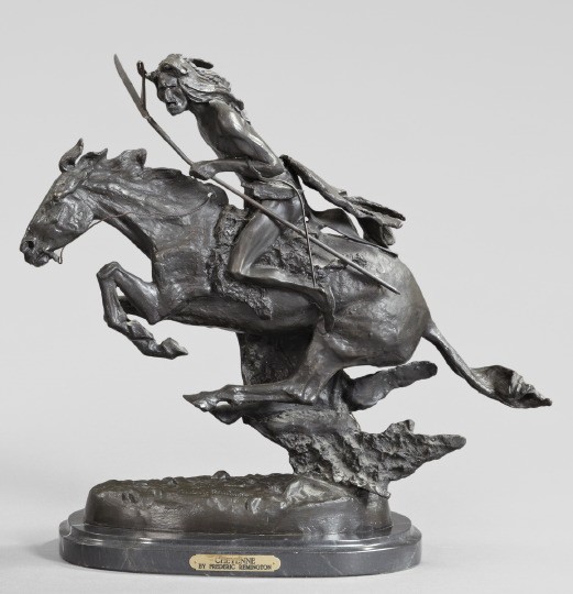 After Frederic S. Remington (American): After Frederic S. Remington (American, 1861-1909) "Cheyenne", a limited edition black/brown patinated bronze group of a shrieking Indian warrior on a galloping mustang stallion, signed at the center o