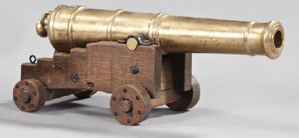 Bell Metal Model of 18th-Century Naval Cannon: Good Bell Metal Model of an 18th-Century Naval Cannon, on its wooden carriage, the cannon barrel mounted to tilt upon the carriage, h. 6", w. 15-1/2", d. 7".