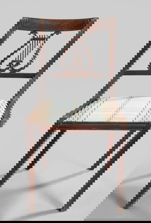 American Classical-Style Mahogany Sidechair,: American Classical-Style Mahogany Sidechair, early 20th century, in the manner of Duncan Phyfe, New York, the back with a central carved splat in the form of a lyre, the back posts and legs reeded, fi