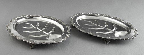 Sheridan Silverplate "Well and Tree" Platters: Pair of Sheridan Silverplate "Well and Tree" Roasted Meats Platters, third quarter 20th century, of oval, footed form and large size, in "Foliate Scroll" decor in the "Old Sheffield" style, h. 1-3/4",