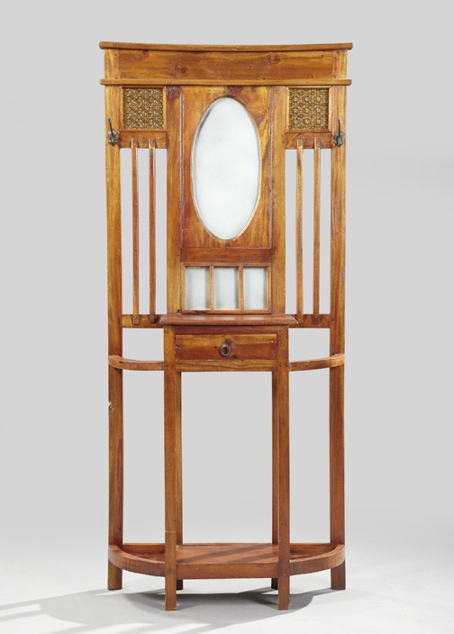 Arts and Crafts-Style Stained Mahogany Hall Tree: Arts and Crafts-Style Stained Mahogany Hall Tree, the molded cornice above a mirrored back, flanked by stamped, stained glass panels and iron hanging hooks, over a short drawer centering two demi-lune