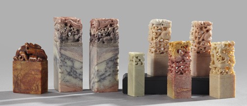 Chinese Carved Soapstone Chops: Eight-Piece Collection of Chinese Carved Soapstone Chops, comprised of a large pair of vieux rose and gray examples of square section carved with celestial dragons; a similar, smaller pair also carved