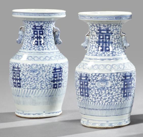 Pair of Tao Kuang Porcelain Vases: Pair of Tao Kuang Blue and White Porcelain Vases, second quarter 19th century, each of two-handled baluster form and emblazoned with multiple "Good Fortune" calligraphic characters on a stylized flowe