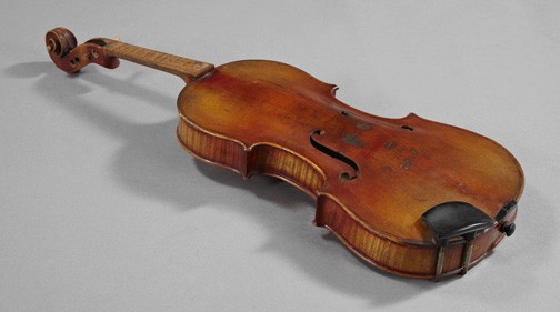 Antique Italian Fruitwood Violin,: Antique Italian Fruitwood Violin, fourth quarter 18th century, the interior with an old printed paper label, the fret, keys and strings lacking, w. 8", l. 24".