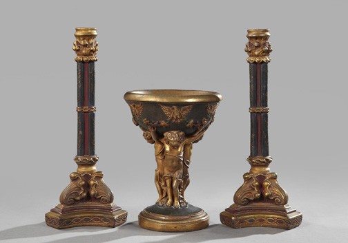 Italian Polychromed, Plaster Garniture: Three-Piece Italian Polychromed, Parcel-Gilt and Antiqued Plaster Garniture, second quarter 20th century, comprised of a central compote supported on the shoulders of three addorsed putti, h. 12", dia