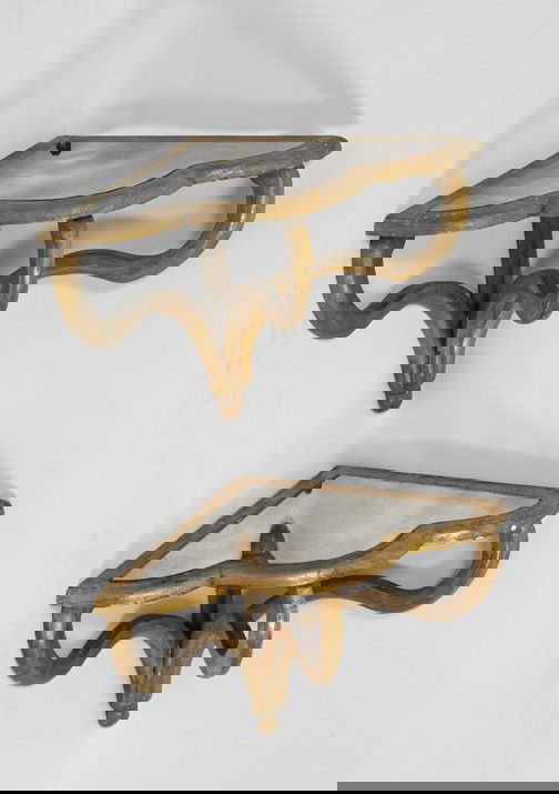 Pair of Italian Antiqued Giltwood Corner Consoles: Pair of Italian Antiqued Giltwood Corner Consoles, second quarter 20th century, with antiqued mirrored glass tops in the neoclassical taste, h. 15", w. 21", d. 14".