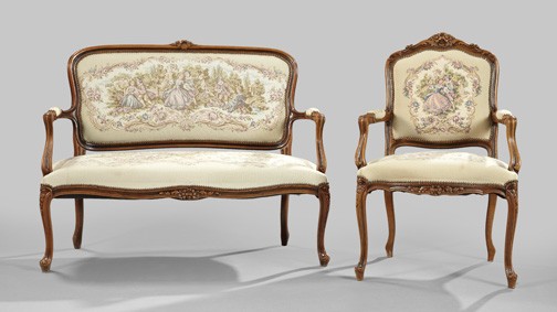 Louis XV-Style Mahogany Settee and Fauteuil,: Louis XV-Style Mahogany Settee and Fauteuil, second quarter 20th century, each with a shaped crest centered by a floral carving, over a conforming padded back, joined to the like seat by open arms, ra