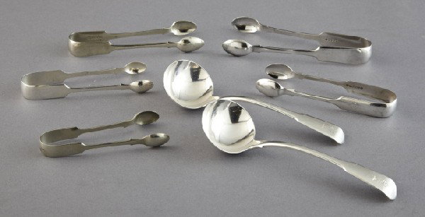British Sterling and Silverplate Serving Pieces: Seven 19th-Century British "Fiddle"-Pattern Sterling and Silverplate Serving Pieces, including a pair of late Georgian sterling silver sauce ladles, hallmarked London, 1805-1806, by Richard Crossley, 