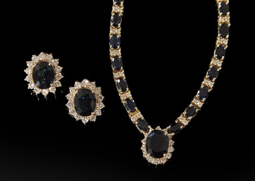 Gold, Sapphire and Diamond Demi-Parure: Fourteen-Karat Yellow Gold, Sapphire and Diamond Demi-Parure, composed of a necklace set with oval-cut Australian blue sapphires and white diamonds and a pair of clip post earrings en suite.