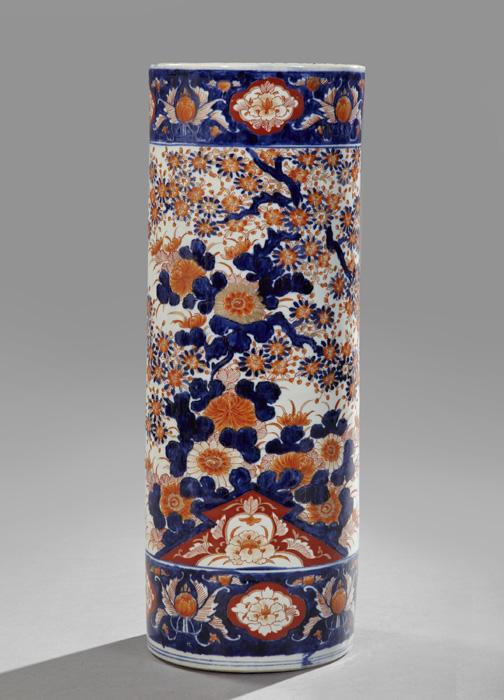 Japanese Imari Porcelain Walking Stick Stand: Japanese Imari Porcelain Walking Stick/Umbrella Stand, early 20th century, of tall cylindrical form in an overall parcel-gilt floral pattern, h. 24-1/2", dia. 9".