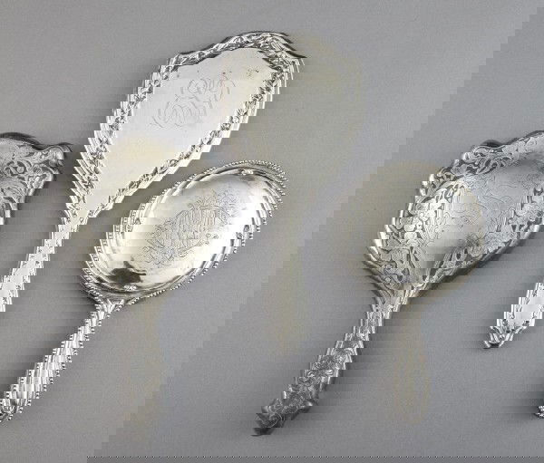 American Sterling Silver and Silverplate Mirrors: Collection of Three American Sterling Silver and Silverplate Hand Mirrors, comprised of an Unger Brothers "Antique Bead" circular example, with a handsome High Victorian entwined-script monogram and a