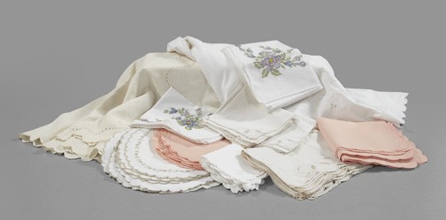 Group of Miscellaneous Table Linens,: Group of Miscellaneous Table Linens, including two large openwork tablecloths and many sets of matching embroidered openwork napkins and place mats, tablecloth 66" x 112".