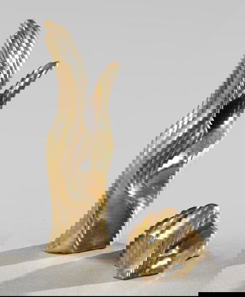 Tom and Bob Bennett (American, 20th Century),: Tom and Bob Bennett (American, 20th Century), two polished bronzes, third quarter 20th century, comprised of a bud vase in the form of a stylized upright hand, h. 6-1/4", and a paperweight/pen holder