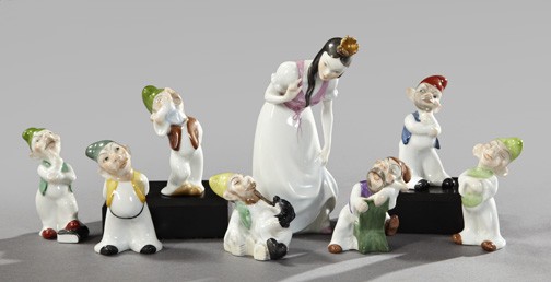 Unusual Eight-Piece Herend Porcelain Group,: Unusual Eight-Piece Herend Porcelain Group, second quarter 20th century, depicting Snow White holding court with her seven dwarfs, each figure with the Herend mark in blue transfer-print on the base, 