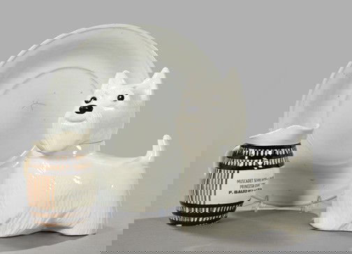 Amusing Three-Piece Continental Pottery Group: Amusing Three-Piece Continental Pottery Group, consisting of an English pottery cookie jar in the form of an alert West Highland White Terrier, second quarter 20th century, the head removing to reveal