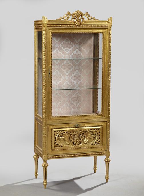 Louis XVI-Style Giltwood Vitrine,: Louis XVI-Style Giltwood Vitrine, mid-20th century, the floral-basket pierced and carved cornice over a case fitted with a glazed door and sides, above a drop door inset with a floral- and acanthine-c