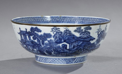 Chinese Export Porcelain Punchbowl: Chinese Export Blue and White Porcelain Punchbowl, fourth quarter 18th century, in "Lakeside Pavilions" decor, one side with an old professional repair, h. 4-3/4", dia. 11-1/4".