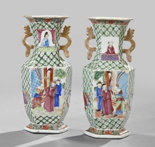 Chinese Export Porcelain Garniture Vases: Pair of Chinese Export "Rose Canton" Porcelain Garniture Vases, second quarter 19th century, of paneled, two-handled form in "Mandarins" decor, the "Mandarins" reserves enframed by a green-latticed gr