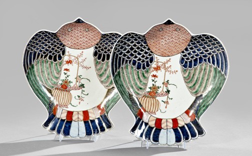 Japanese Meiji Imari Porcelain Serving Bowls: Pair of Japanese Meiji Imari Porcelain Shallow Serving Bowls, of large stylized owl form, the birds' breasts white with asymmetrical polychromed decoration of tubbed flowering plants, w. 12", l. 13".