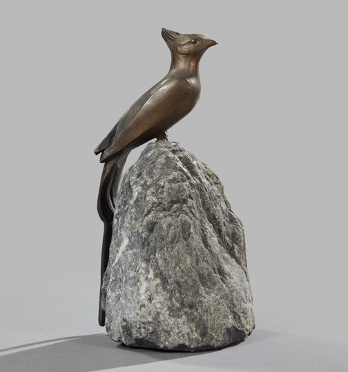 Art Deco Patinated Bronze Tabletop Sculpture: French Art Deco Patinated Bronze Tabletop Sculpture, second quarter 20th century, modeled as a crested long-tailed bird perched on a natural gray stone boulder, h. 9", w. 6", d. 4".