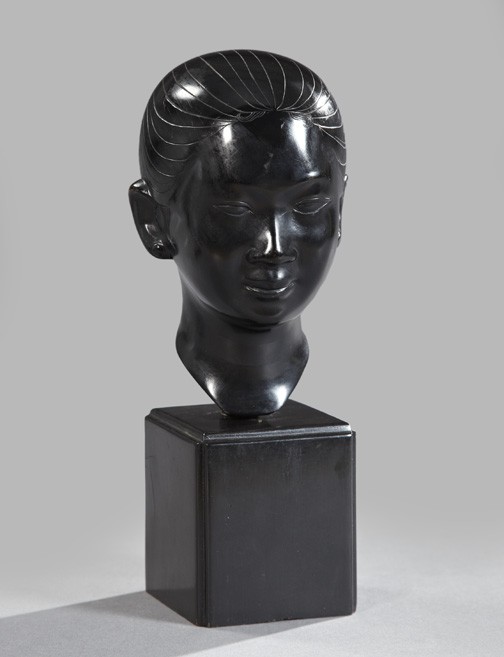 Circle of Jean Despujols (French, 1886-1965),: Circle of Jean Despujols (French, 1886-1965), a patinated bronze tabletop portrait head of "Nguon", a Vietnamese woman, second quarter 20th century, signed to the left of the chignon in calligraphy "V