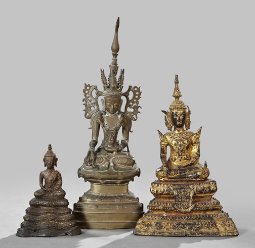 Three Thai and Nepalese Figures of Buddha: Group of Three Thai and Nepalese Figures of Buddha, comprised of a Nepalese weighted brass figure of an elaborately crowned Buddha seated in the lotus position, fourth quarter 19th century; a smaller 