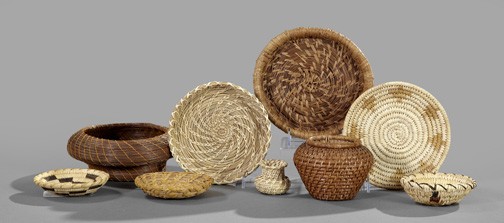 Various North American Hand-Woven Baskets: Suite of Nine Various North American Hand-Woven Baskets, consisting of six Papago, Tohono O'oDham; an early 20th-century Alaskan coiled vase; and two Seminole Indian, Florida, bound pine needle basket