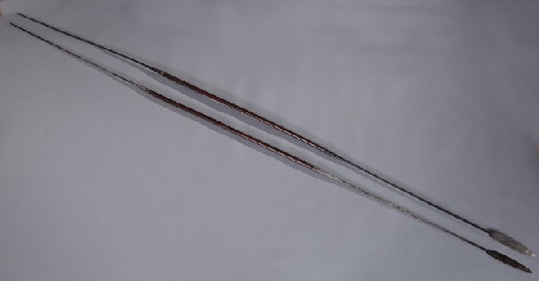 Two African Massai Elder Spears,: Two African Massai Elder Spears, each of forged steel and wood, dismantling into three sections, l. 100". Elder spears were used by the young Massai warriors to prove their manhood by killing a lion. 