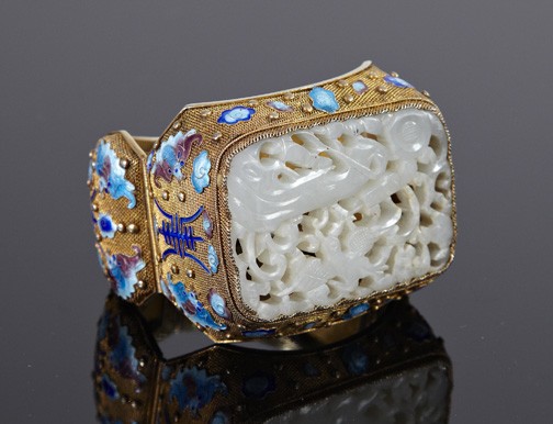 Chinese Jade, Silver-Gilt and Enamel Cuff Bracelet: Chinese Jade, Silver-Gilt and Enamel Cuff Bracelet, composed of a reticulated white jade plaque set in a silver-gilt filigree mount with enamel decoration, dia. 2-1/4".