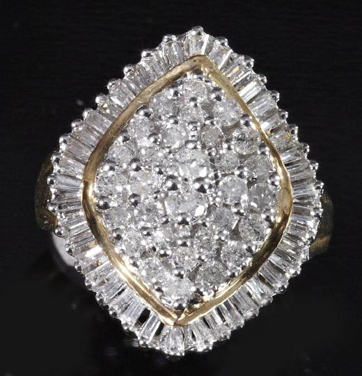 Gold and Diamond Lady's Cluster Ring: Eighteen-Karat Two-Color Gold and Diamond Lady's Cluster Ring, composed of a central diamond-shaped cluster of round brilliant-cut white diamonds surrounded by a ballerina-style border of baguette-cut