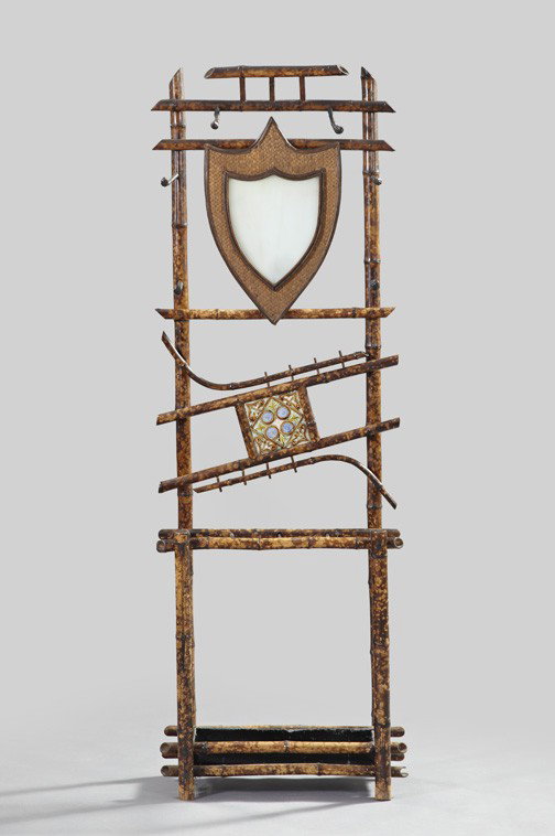 Victorian Bamboo Hall Tree,: Victorian Bamboo Hall Tree, ca. 1900, fitted with a shield-form mirror plate flanked by hanging hooks, above a compartmented open umbrella stand fitted with a tin liner, h. 77", w. 26-1/2", d. 12".