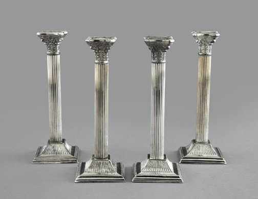 Edwardian Silverplate Candlesticks: Set of Four Edwardian Silverplate "Corinthian Column" Candlesticks, first quarter 20th century, in the George III style, weighted, h. 10", w. 3-5/8", d. 3-5/8".