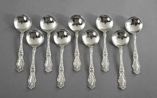 Wallace Silversmiths Sterling Silver Bouillon Spoo: Rare Set of Nine Wallace Silversmiths Sterling Silver "Irian" Bouillon Spoons, the pattern introduced in 1902, l. 5-1/4", 6.35 total t. oz.