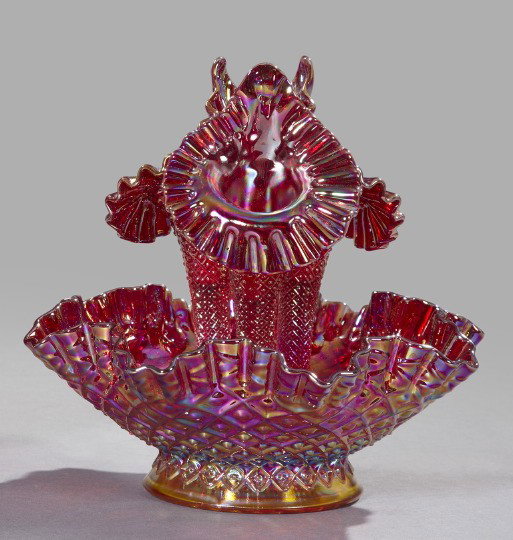 Iridized Ruby Carnival Glass Trumpet Epergne: Fenton Purple/Blue Iridized Ruby Carnival Glass Three-Trumpet Epergne, third quarter 20th century, in "Lattice Diamond" pattern, the three lily-form trumpets with gauffered rims and detachable from th