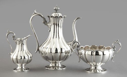 Sheffield Silverplate Ribbed Coffee Service: Three-Piece Sheffield Silverplate Ribbed Coffee Service, fourth quarter 19th century, by James Dixon and Sons, comprised of a tall footed coffeepot with an upright ribbed gourd cover finial, a generou